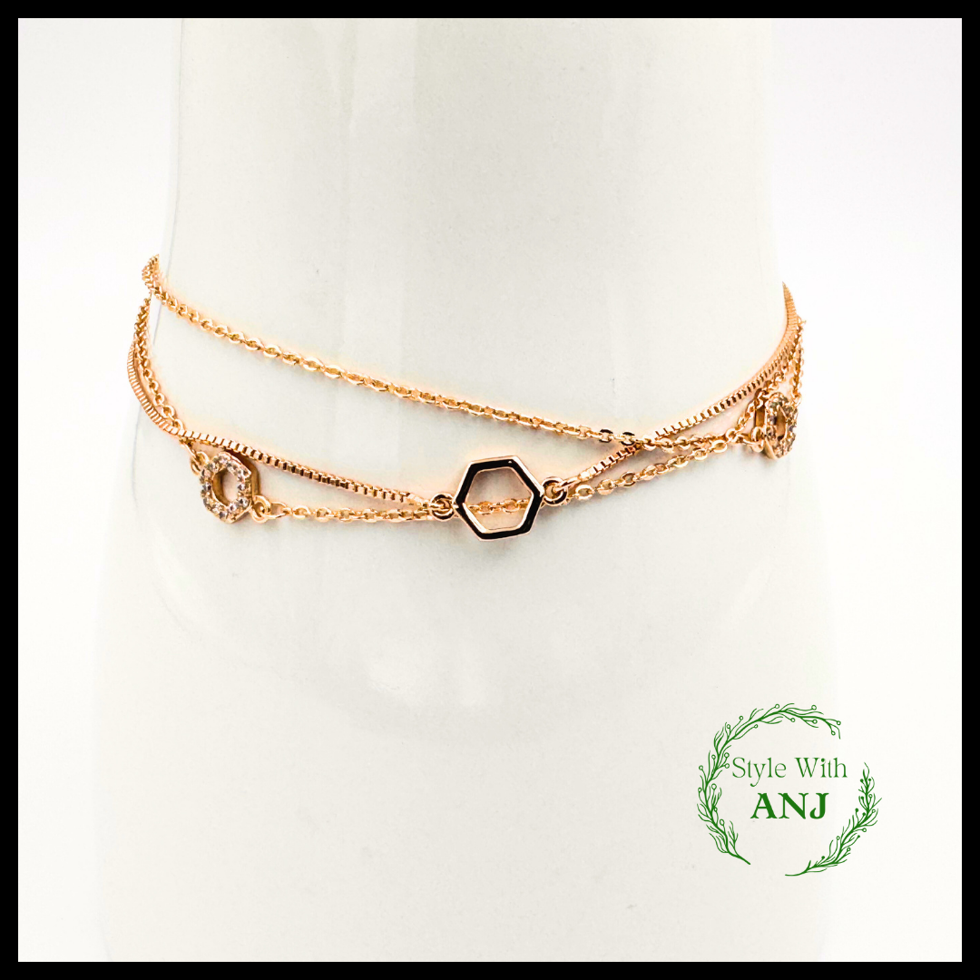 Refined Elegance: Three-Layered Gold Chain Bracelet