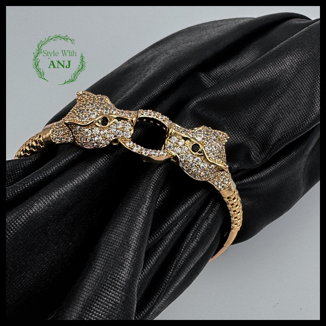 Wild Elegance: Crystal Leopard Head Gold Tone Bangle Bracelet