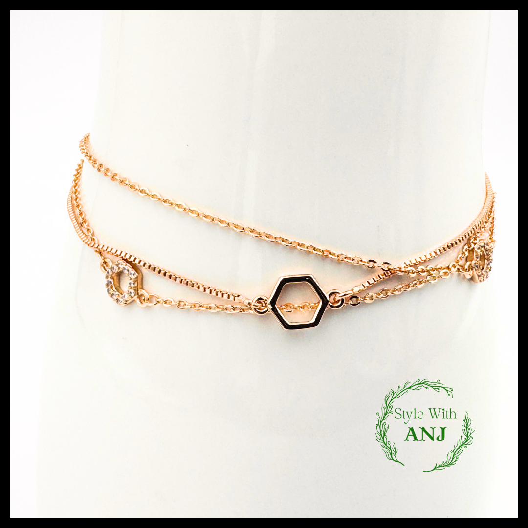 Refined Elegance: Three-Layered Gold Chain Bracelet