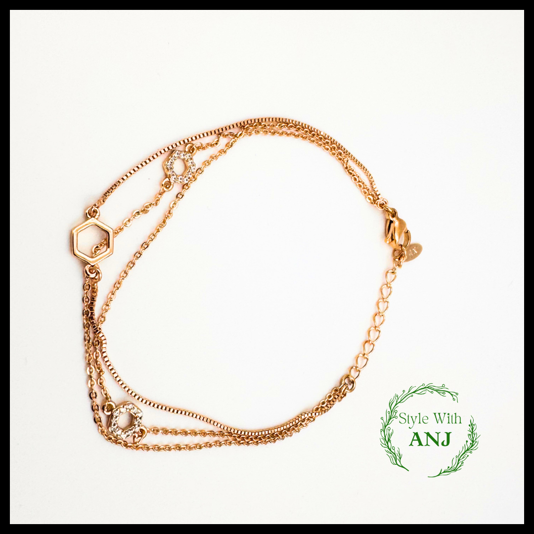 Refined Elegance: Three-Layered Gold Chain Bracelet