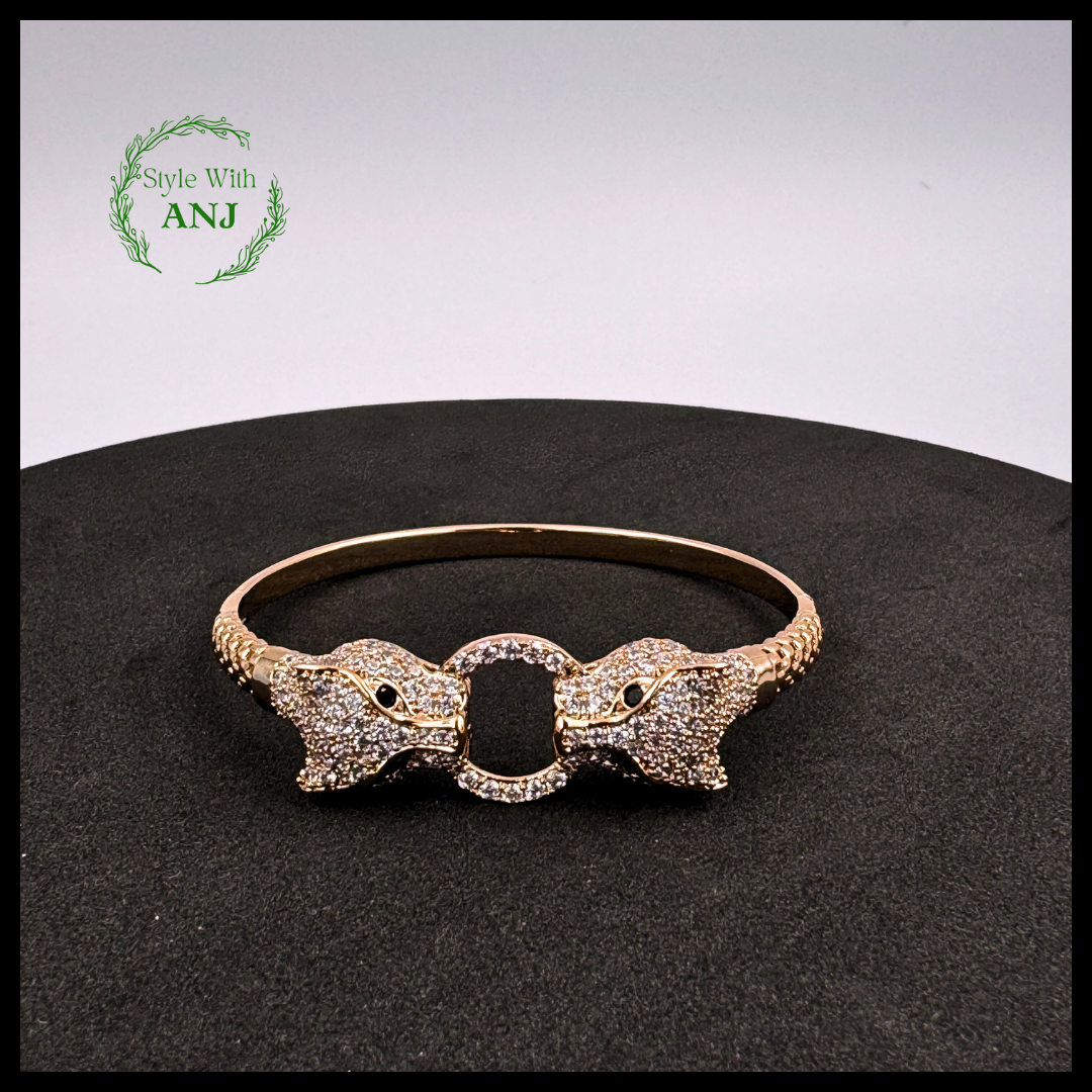 Wild Elegance: Crystal Leopard Head Gold Tone Bangle Bracelet