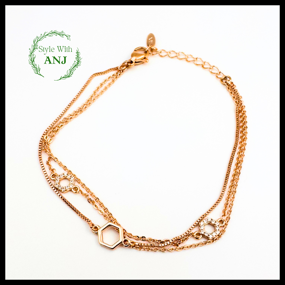 Refined Elegance: Three-Layered Gold Chain Bracelet