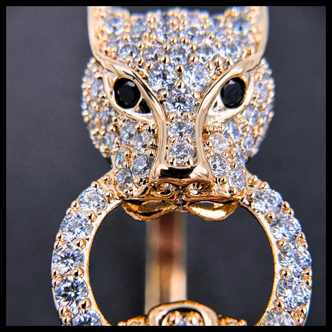 Wild Elegance: Crystal Leopard Head Gold Tone Bangle Bracelet