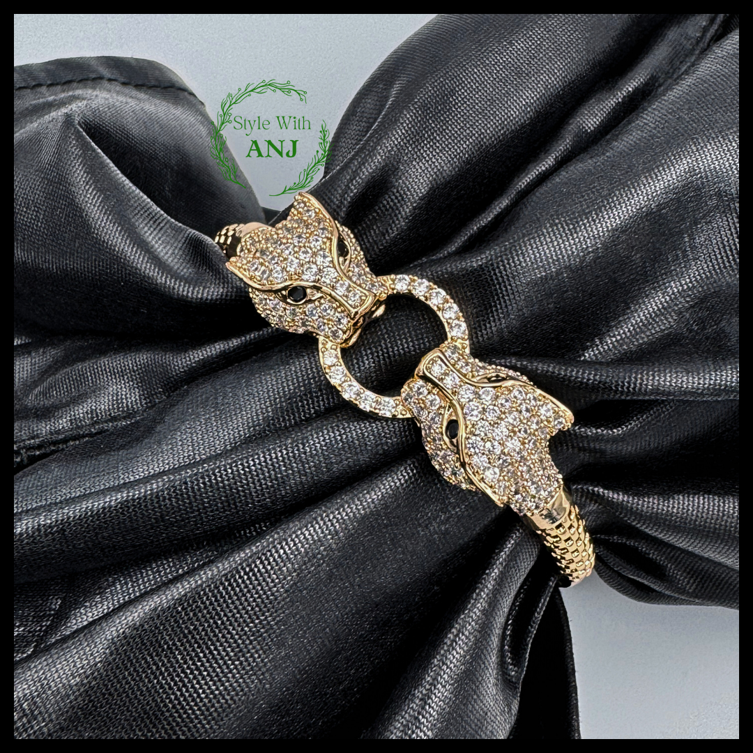 Wild Elegance: Crystal Leopard Head Gold Tone Bangle Bracelet