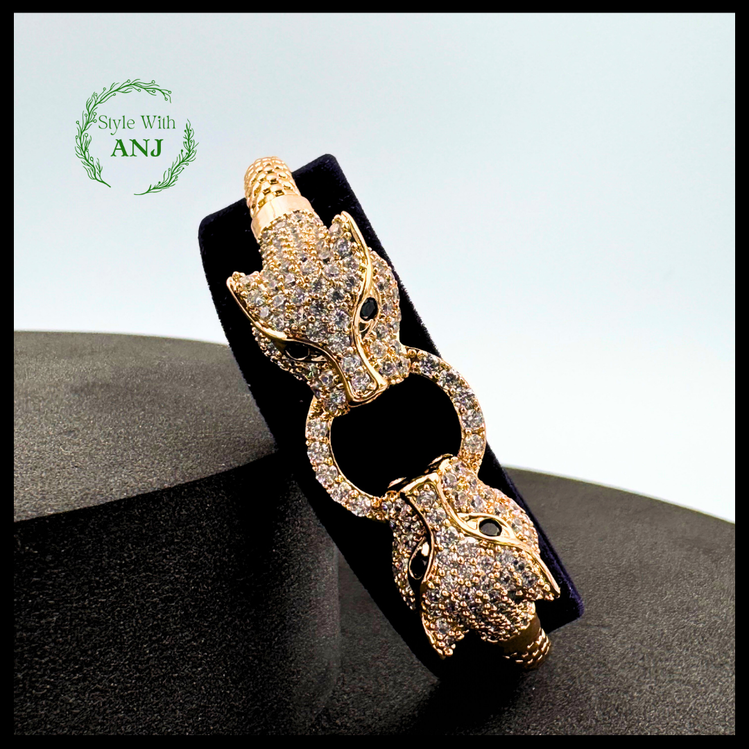 Wild Elegance: Crystal Leopard Head Gold Tone Bangle Bracelet