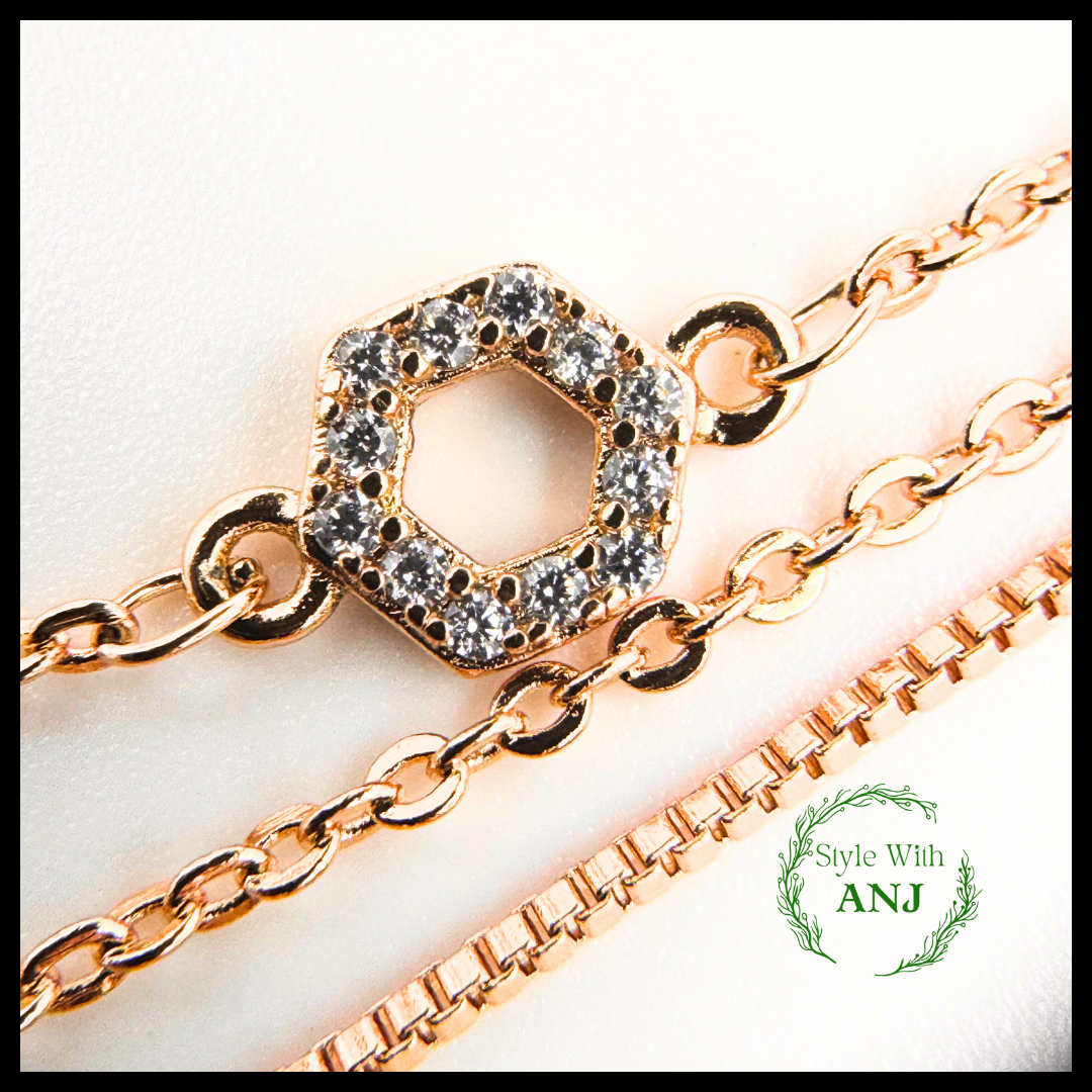 Refined Elegance: Three-Layered Gold Chain Bracelet