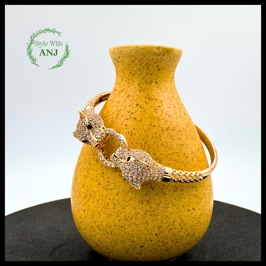 Wild Elegance: Crystal Leopard Head Gold Tone Bangle Bracelet